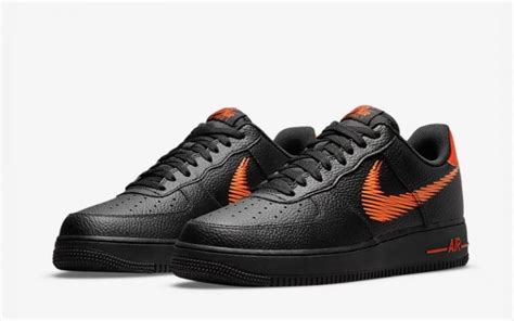 nike airforce bovenkant zwart met oranj|Nike Air Force 1 sneakers.